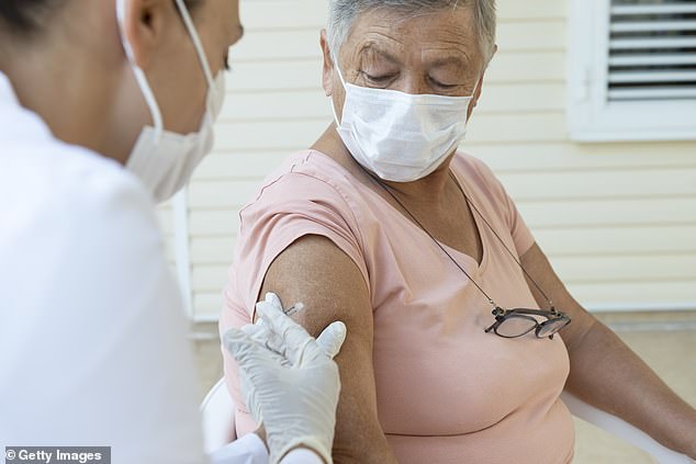 The Covid vaccine may be linked to a small increase in stroke risk when given alongside a high-dose flu shot, health officials say