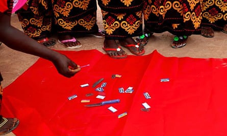 Ex-practitioners of FGM take part in a Dropping of the Knife ceremony in the Gambia.