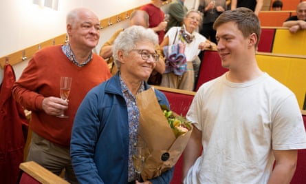 Anne L’Huillier, only the fifth woman to win the prize, celebrates with her son Oscar, right, and husband Claes-Göran at Lund University, Sweden