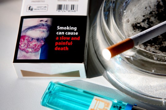 Cigarette packets have carried graphic warning pictures for many years (Picture: Getty)