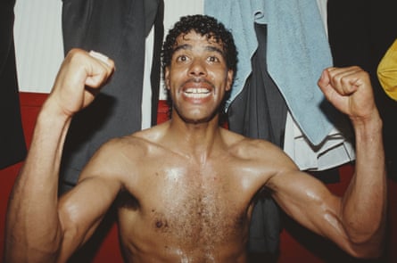 Leeds United player Chris Kamara celebrates in the dressing room after Leeds United had gained promotion to the 1st Division, after a Division two match at Dean Court between AFC Bournemouth and Leeds United on May 5, 1990 in Bournemouth, England