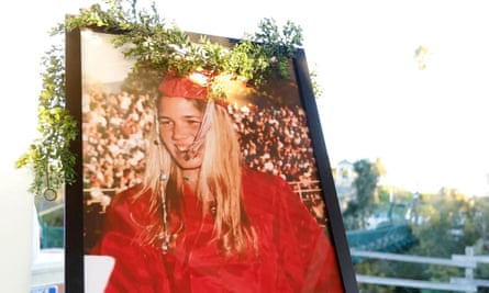 A portrait of Kristin Smart who is missing in California is on display at a candlelight vigil.