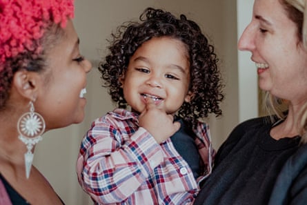 Taylor-Rey and Libby J’Vera, with their two-year-old son River Jacques J’Vera at home in Bed-Stuy, Brooklyn, on 24 October 2023.