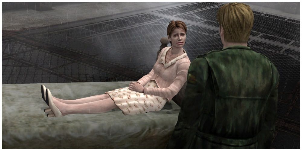 James from Silent Hill 2 looking down at a woman who is resting on a bed