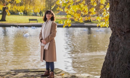 The Stratford-upon-Avon Liberal Democrat party candidate, Manuela Perteghella, stands by a lake in a park