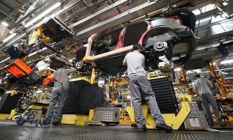 Workers on the production line at Nissan's factory in Sunderland