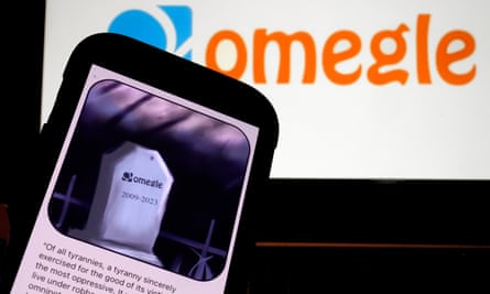 image of phone with image of gravestone that says ‘omegle, 2009-2023’