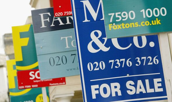 For sale signs outside houses