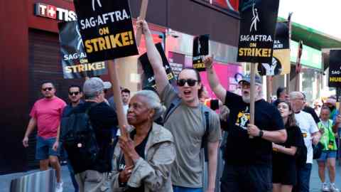 SAG-AFTRA members on the picket line in front of Paramount in Times Square on August 31, 2023 in New York City.
