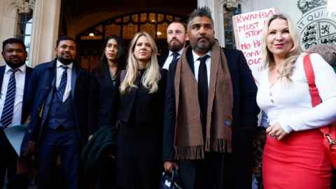 Toufique Hossain representing asylum seekers leaves the Supreme Court with his team