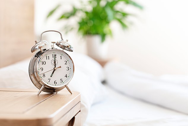 Ali Mazaheri, a neuroscientist, said: 'I'd visit your loved one as soon as you can after their operation and also make sure they have items from home that can help reorientate them ¿ such as a bedside clock they are used to looking at or pictures of family' (stock image)