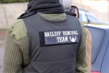 A bailiff at an eviction in Nottingham.