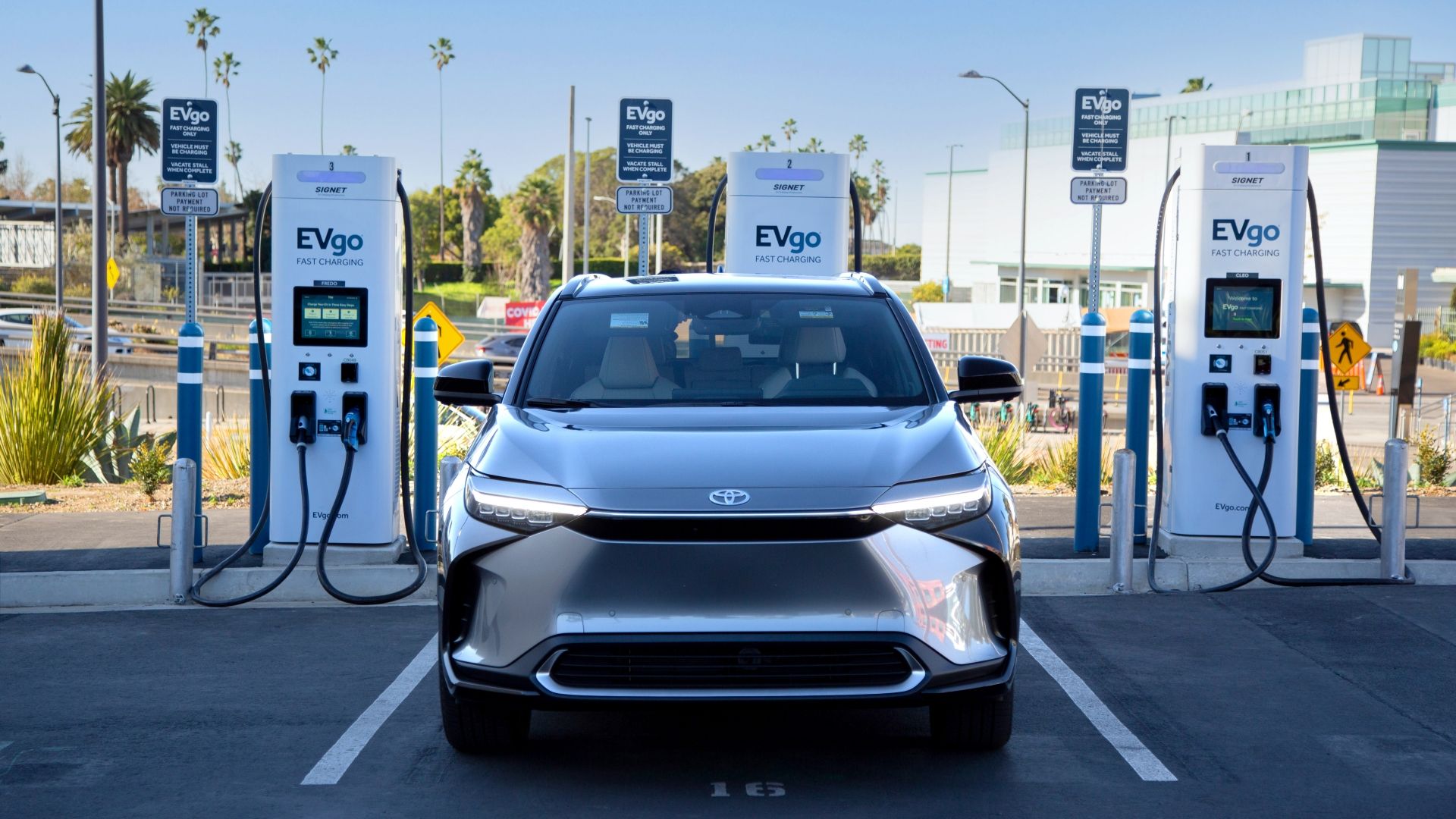 A Toyota bZ4X parked at an EVgo charging station