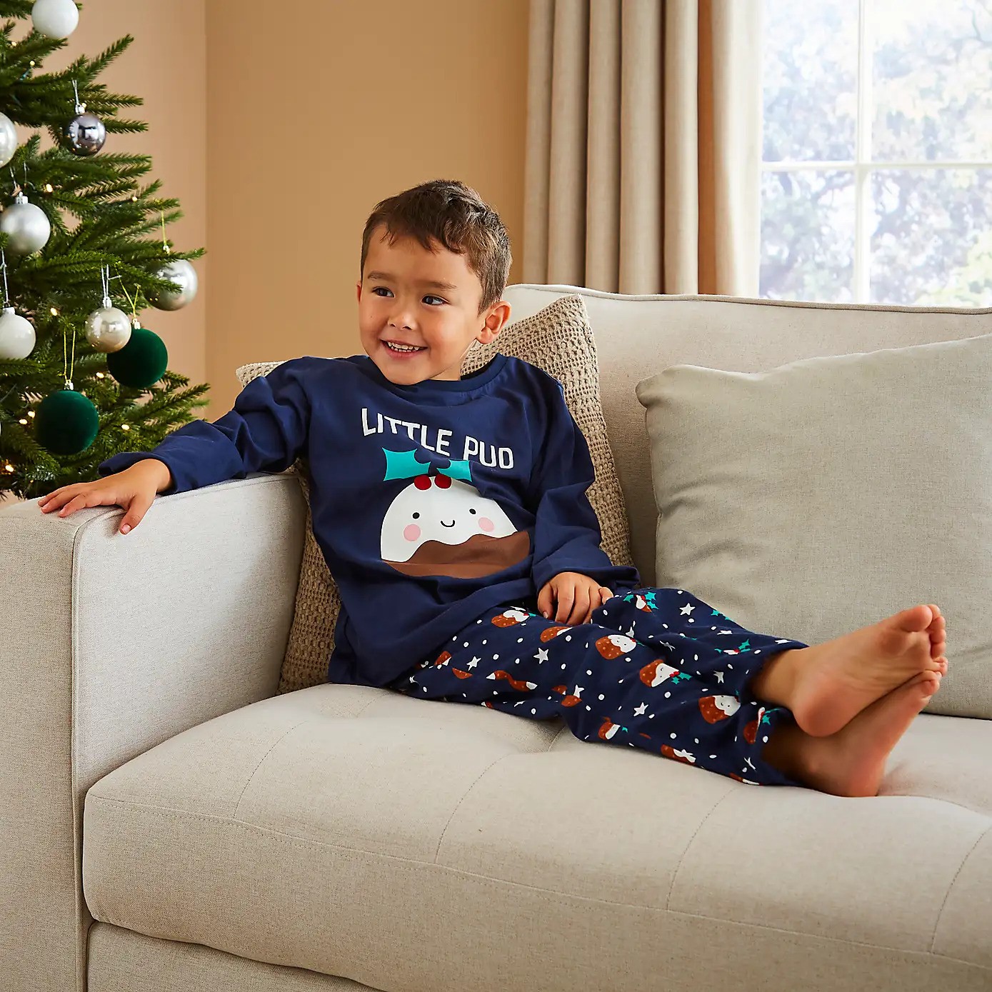 Save £6 on a Christmas pudding pyjama set from Dunelm