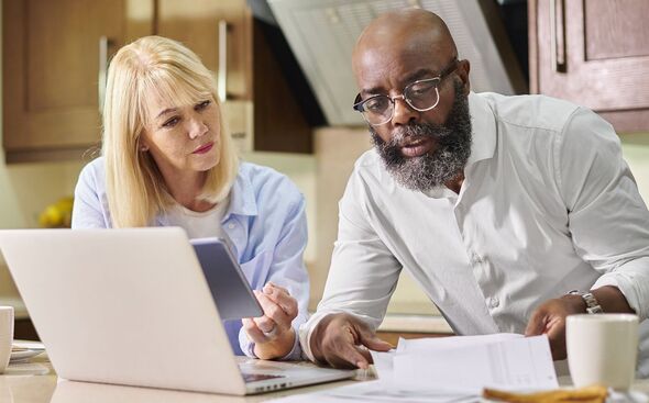 A couple check their finances