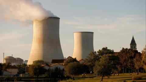 Steam rises from a cooling tower of the Electricite de France nuclear power station in Civaux, France