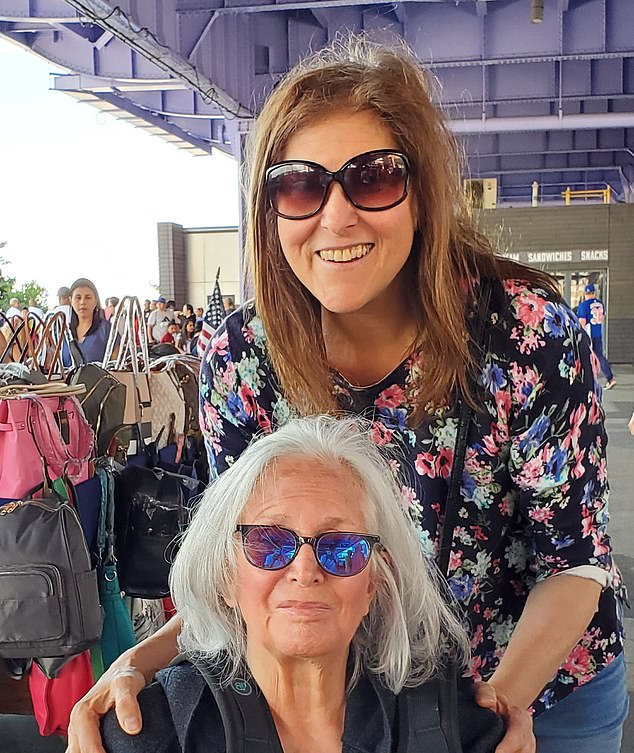 Amy Hatkoff, whose sister Susan [pictured sitting] passed away after a 12-year battle with the disease, is spending her third Christmas without her big sister