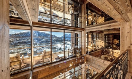 Inside of luxury ski chalet with mountains in the background