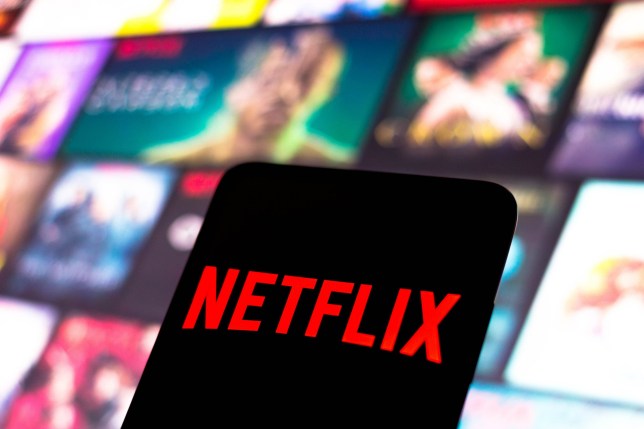 In this photo illustration, the Netflix logo seen displayed on a smartphone screen.