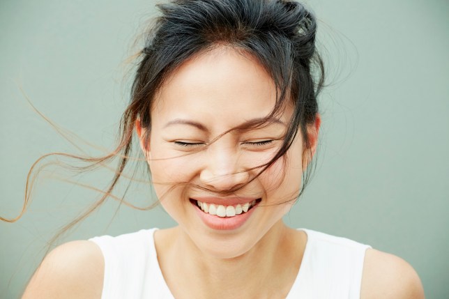 Portrait of woman laughing