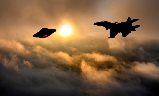 Fighter jet attacks a UFO