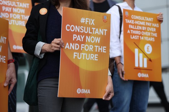 LONDON, ENGLAND - AUGUST 25: NHS consultants demonstrate at a British Medical Association (BMA) picket line outside University College Hospital on August 25, 2023 in London, England. It is the second strike of the year by NHS consultants in England represented by the British Medical Association. (Photo by Hollie Adams/Getty Images)