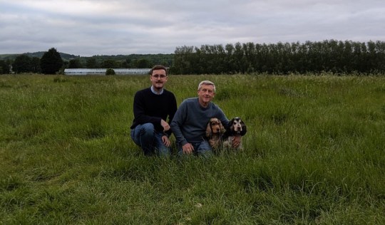 Dave Richardson with his son and dogs