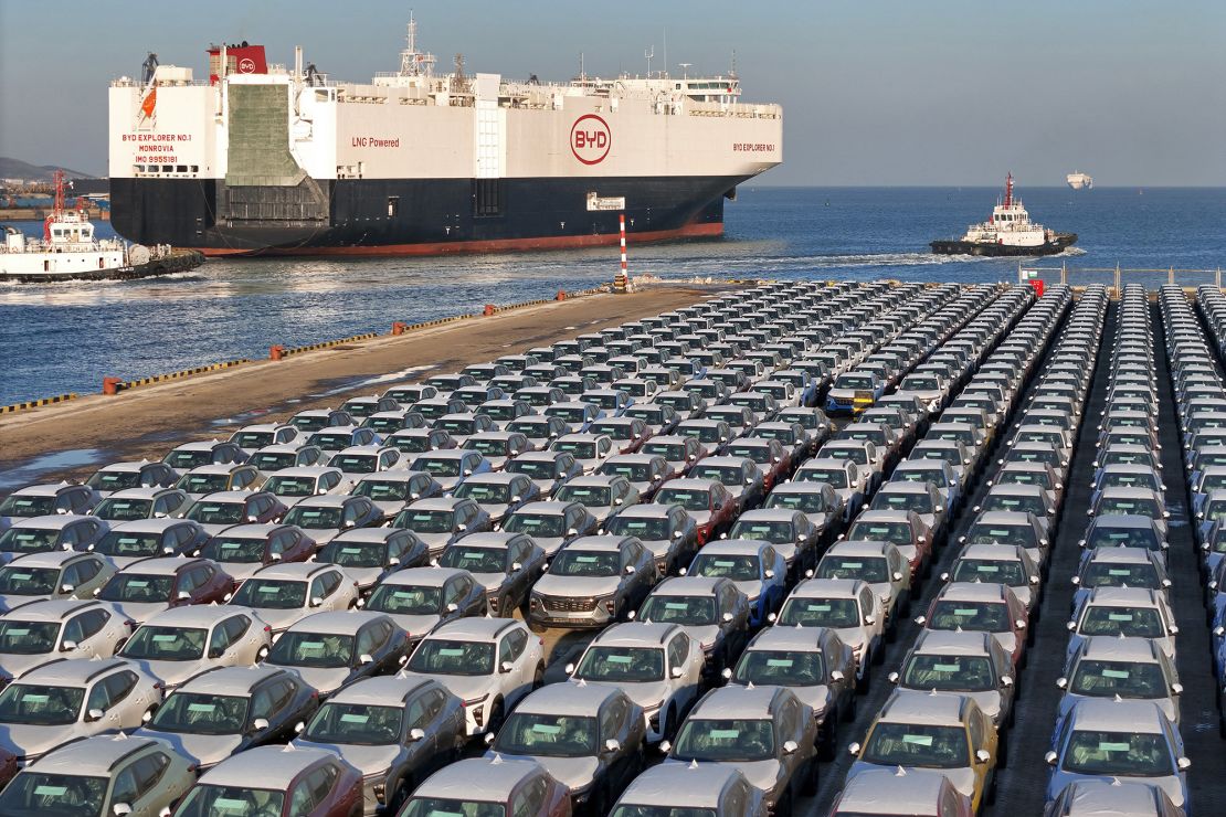 Electric cars waiting to be loaded onto 