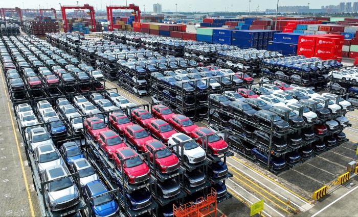 Hundreded of BYD electric cars stacked at a port in China waiting to be loaded on a ship 