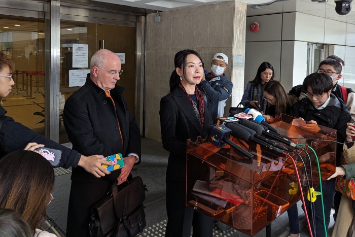 Edward Middleton, second from left, and Tiffany Wong, centre