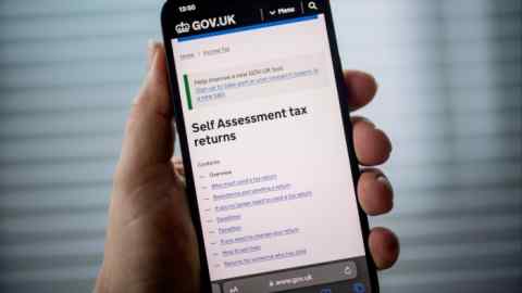 HMRC’s self-assessment web page displayed on a mobile phone screen