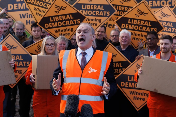 Lib Dem leader Sir Ed Davey with supporters in Guildford on Wednesday