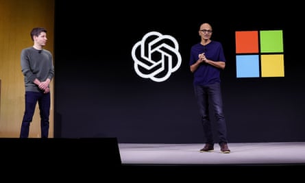 Microsoft CEO, Satya Nadella (right), speaks as OpenAI CEO, Sam Altman, looks on during the OpenAI DevDay event in San Francisco, November 2023.