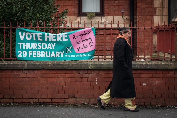 A banner on a polling station encourages people to vote