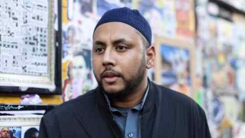 IT worker Mohammed Rahman outside a mosque in Bethnal Green, London, England