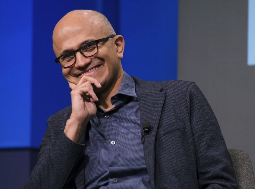 Satya Nadella smiles.