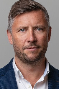 Headshot of Dan Squires, head of sales at Saxo UK