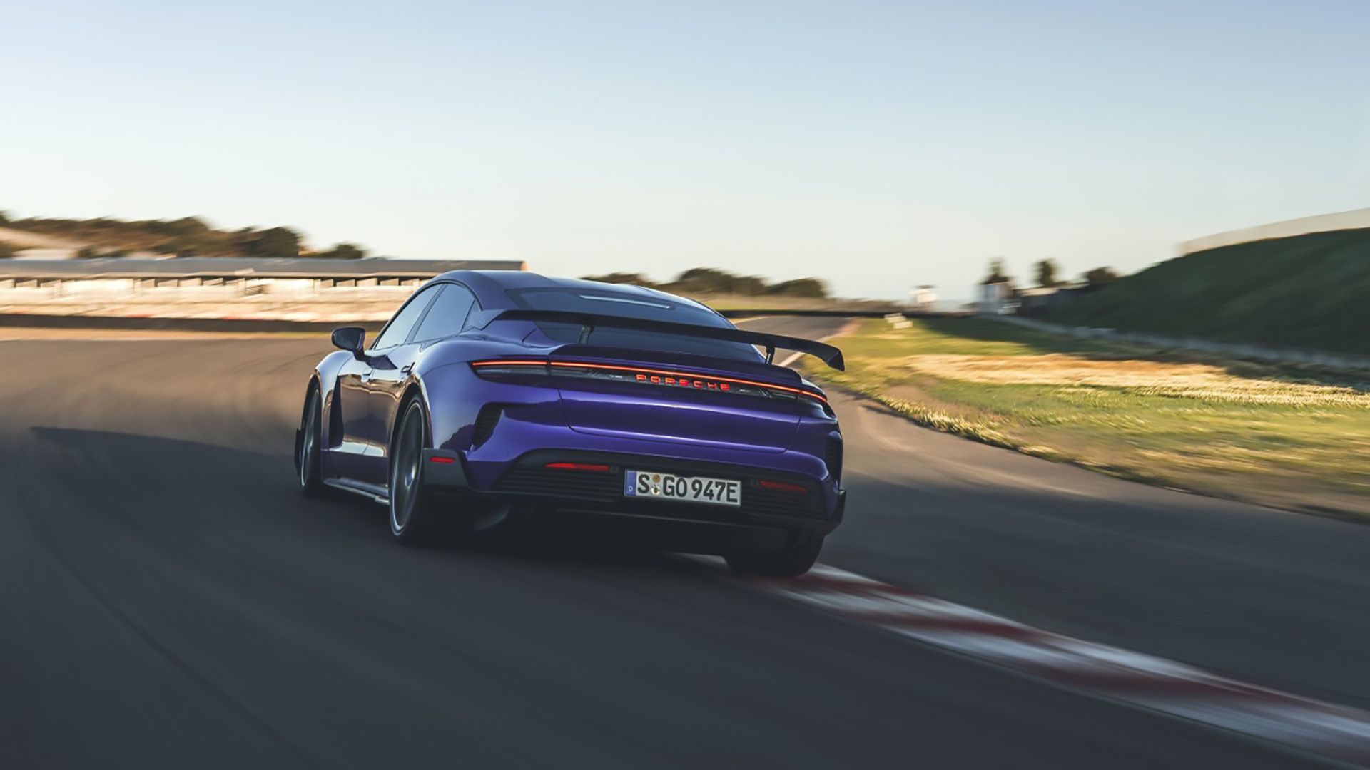 A purple 2025 Porsche Taycan Turbo GT with Weissach Package 