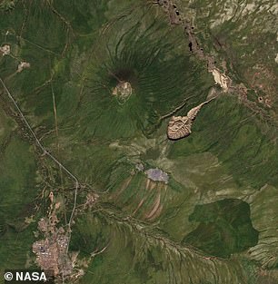 Above, a 2016 NASA satellite image of the Batagaika Crater's expansion