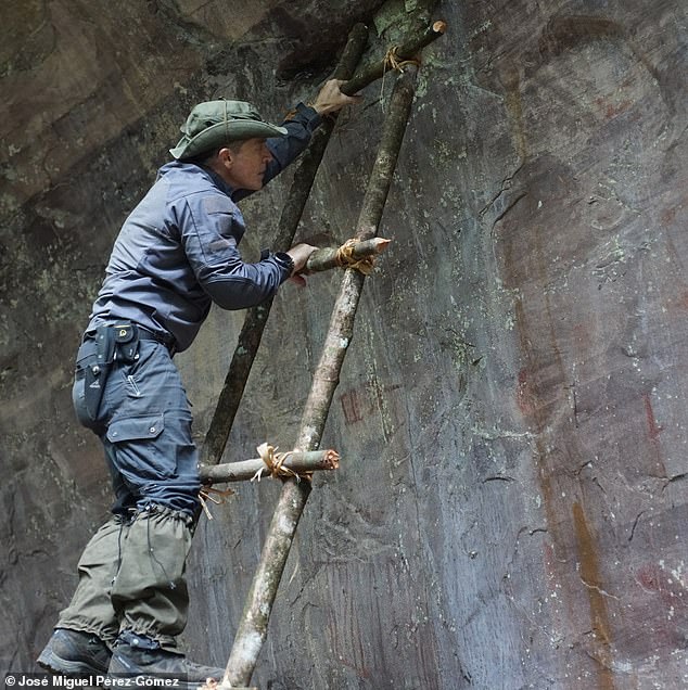Some of the drawings were in out-of-reach areas that required the team to climb a ladder to photograph them