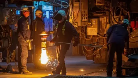 Getty Images Steel workers