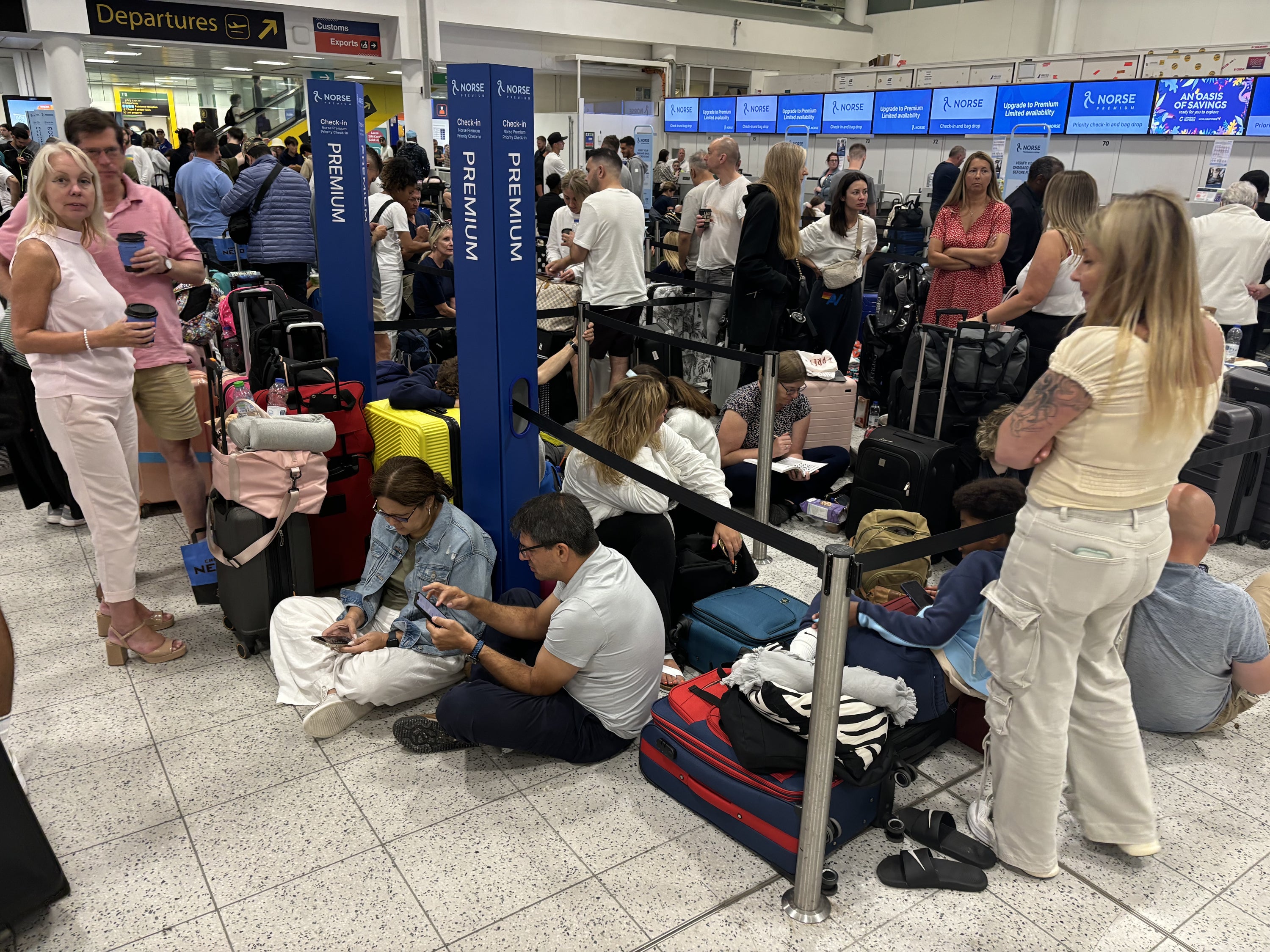 Passengers in the South Terminal at Gatwick Airport (Brian Lawless/PA)