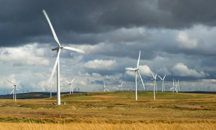 wind turbines under a cloudy sky