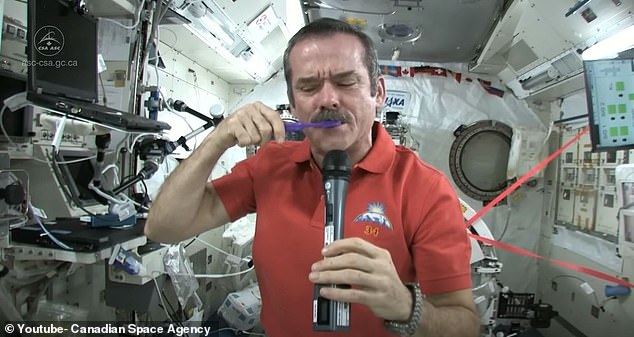 Astronauts have about an hour to get clean, have breakfast and brush their teeth. Here Canadian astronaut Chris Hadfield demonstrates how brushing your teeth works just the same as it does on Earth