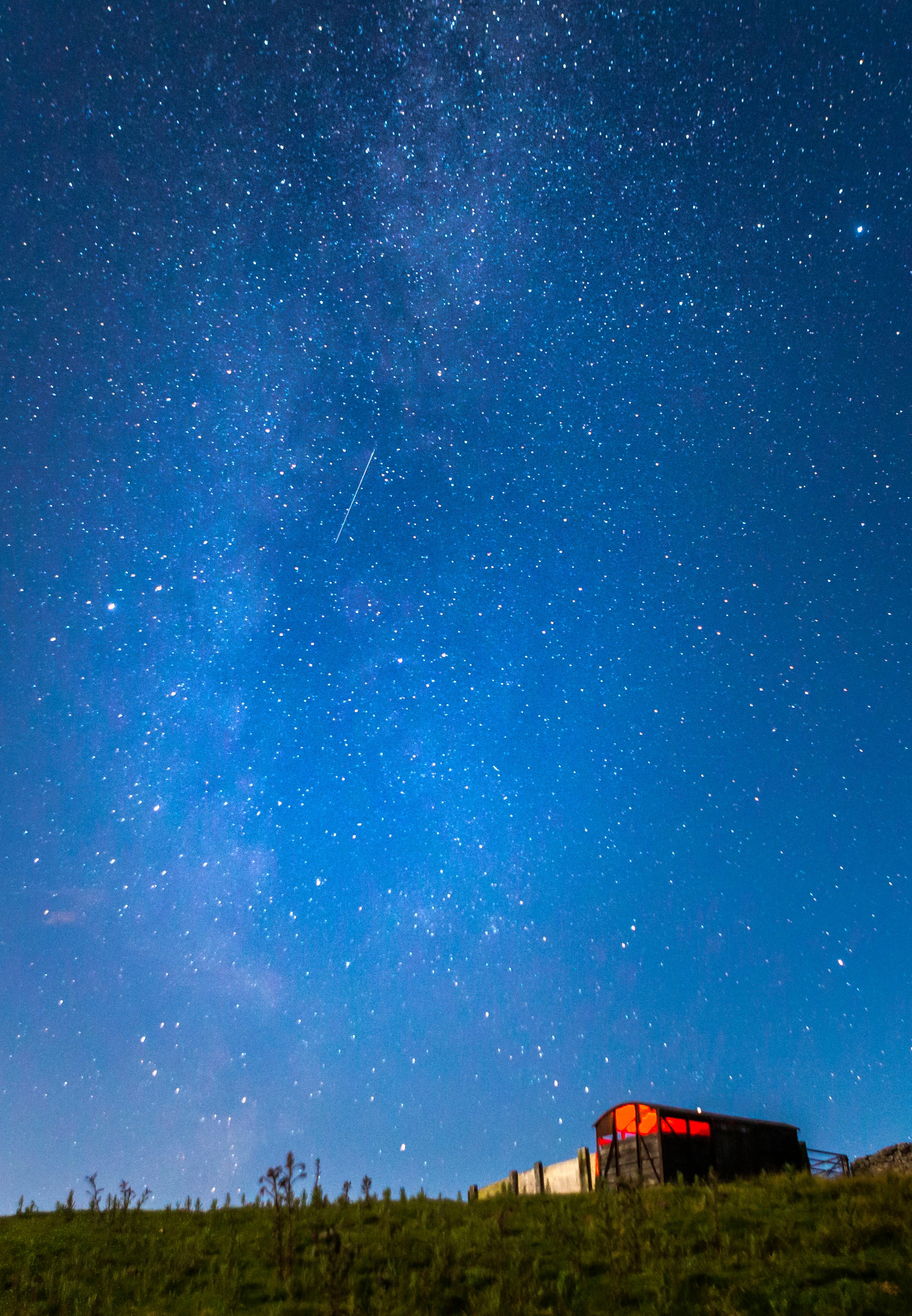 A meteor during a Perseid meteor shower seen from the Yorkshire Dales (Danny Lawson/PA)