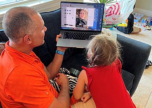 Mrs Mennon's reading was livestreamed back to her family (pictured) and a group of patients at the St Jude Children’s Research Hospital