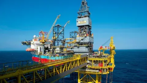 Getty Images An oil rig in the middle of the sea