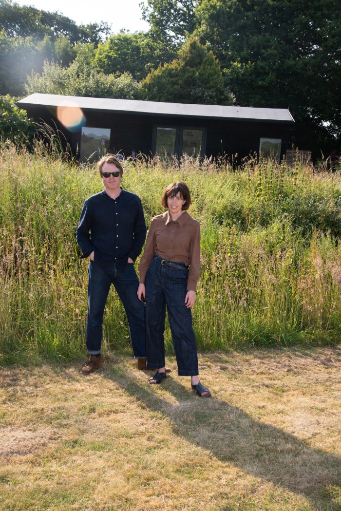 Poppy and Joseph Jones outside Poppy’s studio in East Sussex