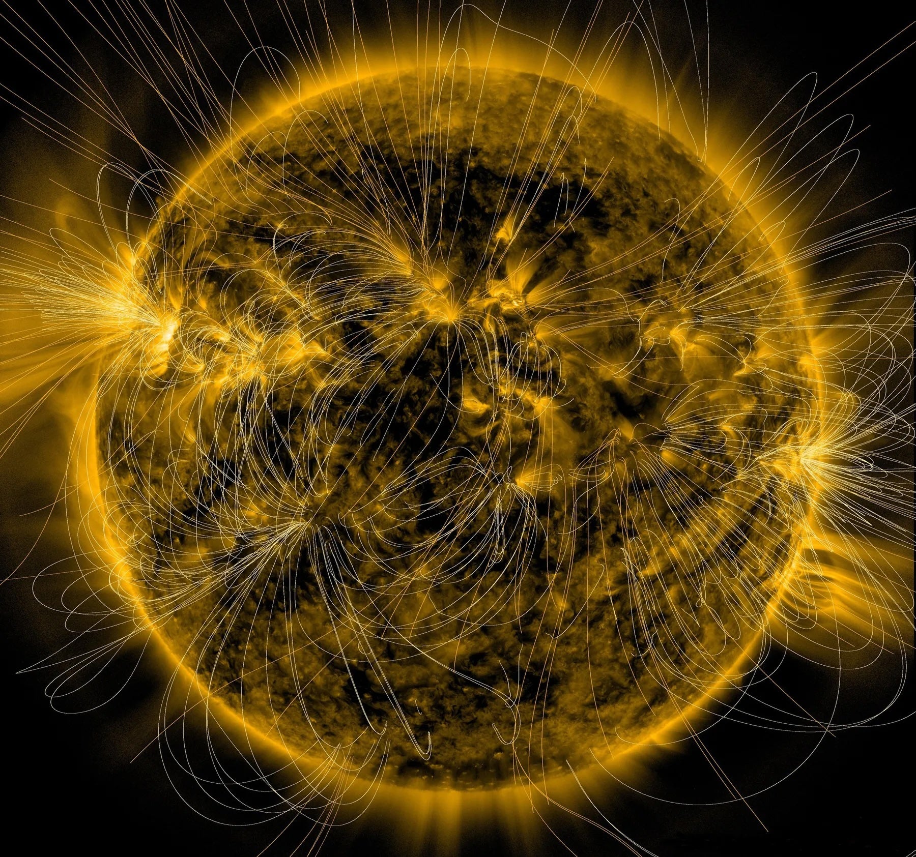 A depiction of the sun’s magnetic fields is overlaid on an image of the sun. The star was captured in extreme ultraviolet light by NASA’s Solar Dynamics Observatory in March of 2016. Scientists say they’re concerned about the impact of immense solar storms that have the power to affect satellites and astronauts in space, power grids on Earth, radio, and GPS