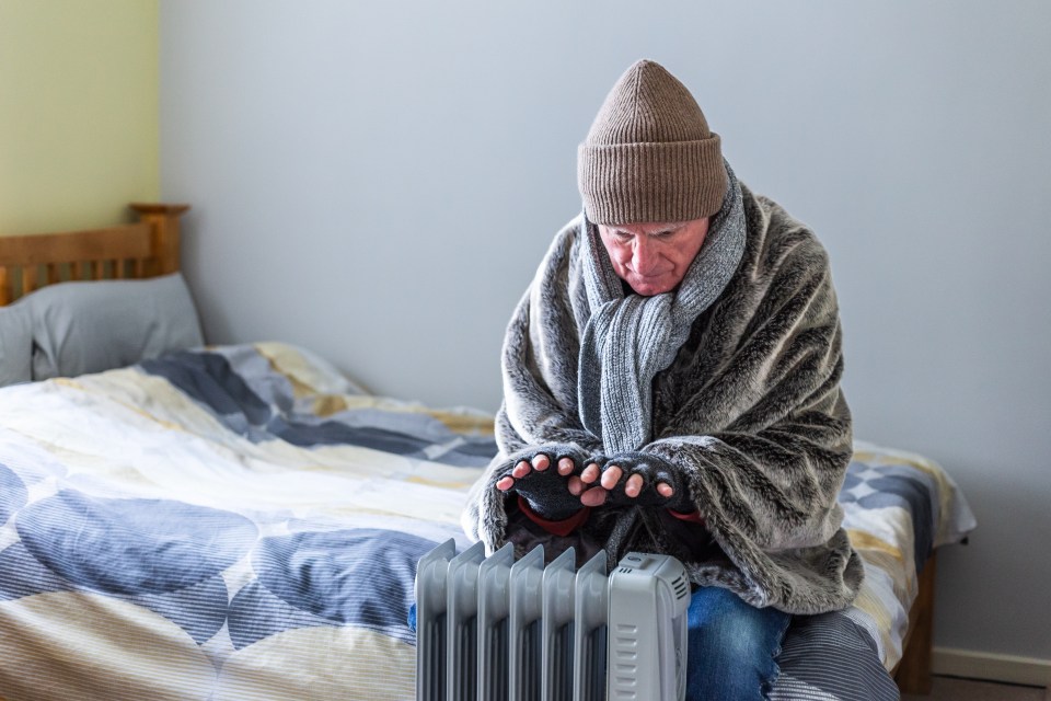 A pensioner keeping warm (stock pic)